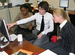 Nolizwe, Michael and Line Preparing the Weekly E-Newsletter